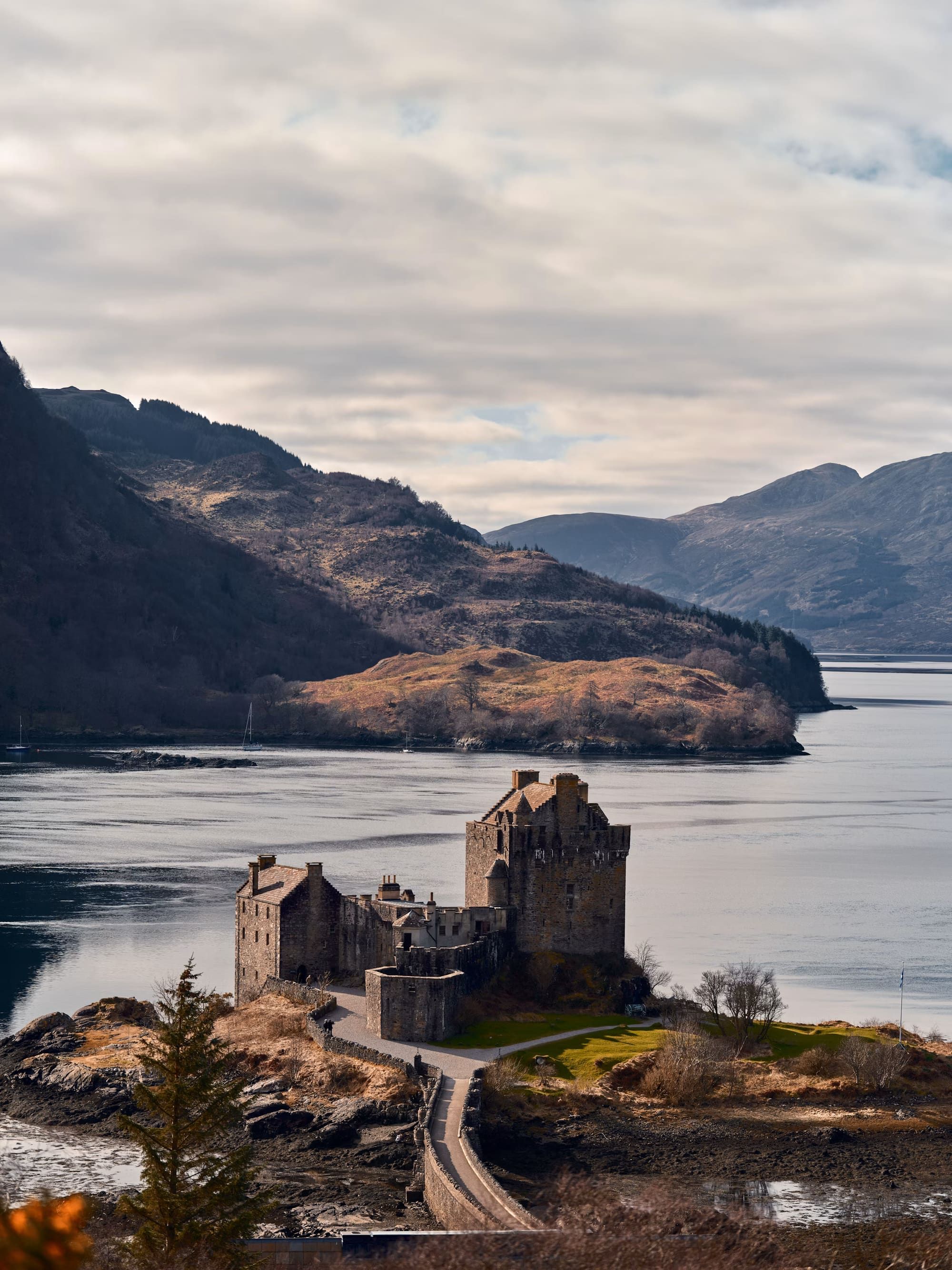 A castle perched on an island in a loch